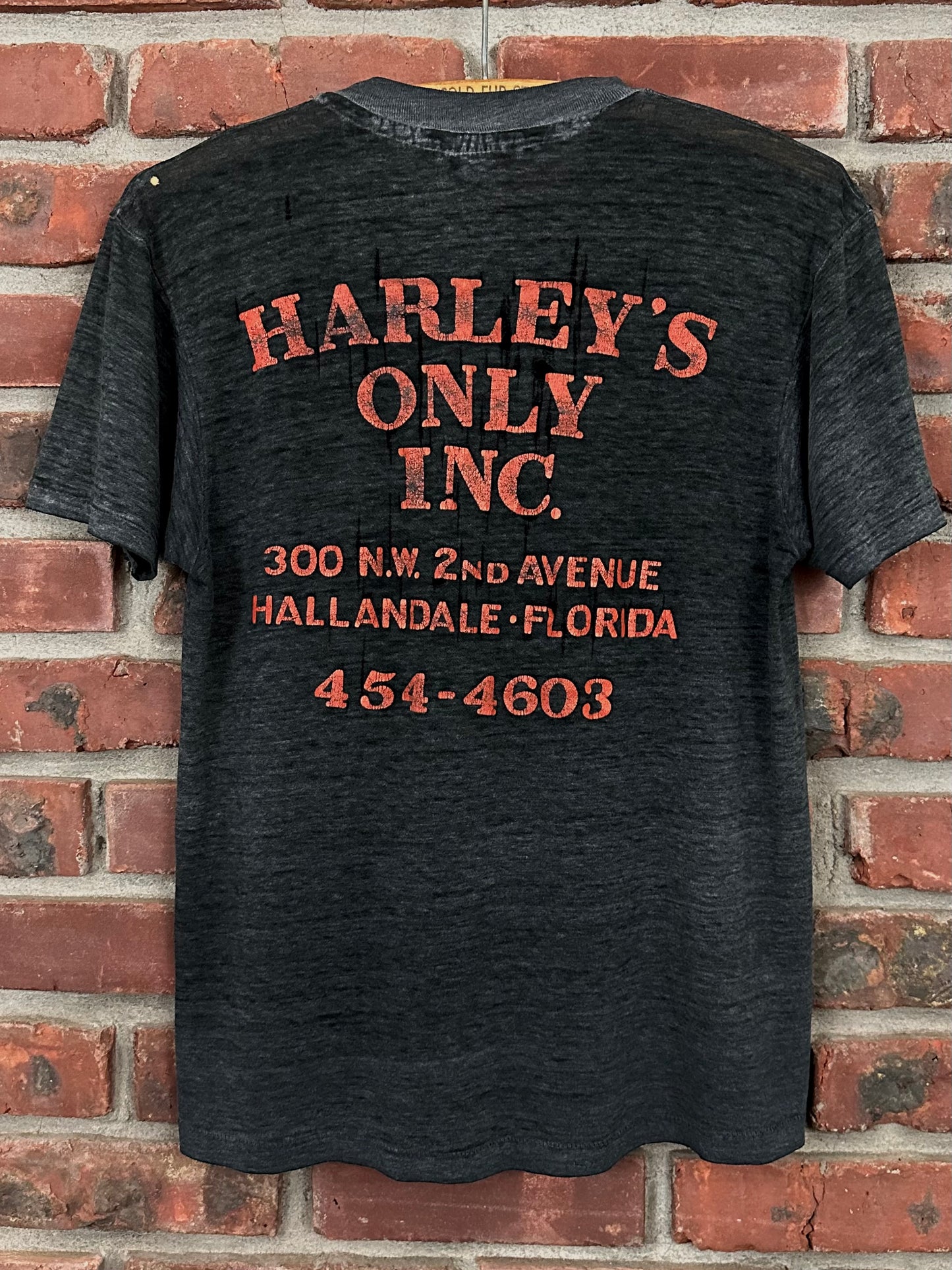 Vintage 80s 1980s HARLEY DAVIDSON Motorcycles Eagle Bar and Shield T-Shirt Harley Only Inc Hallandale Florida FL Dealer Thrashed Distressed Paper Thin Burnout Faded Black Hanes Mens Small S