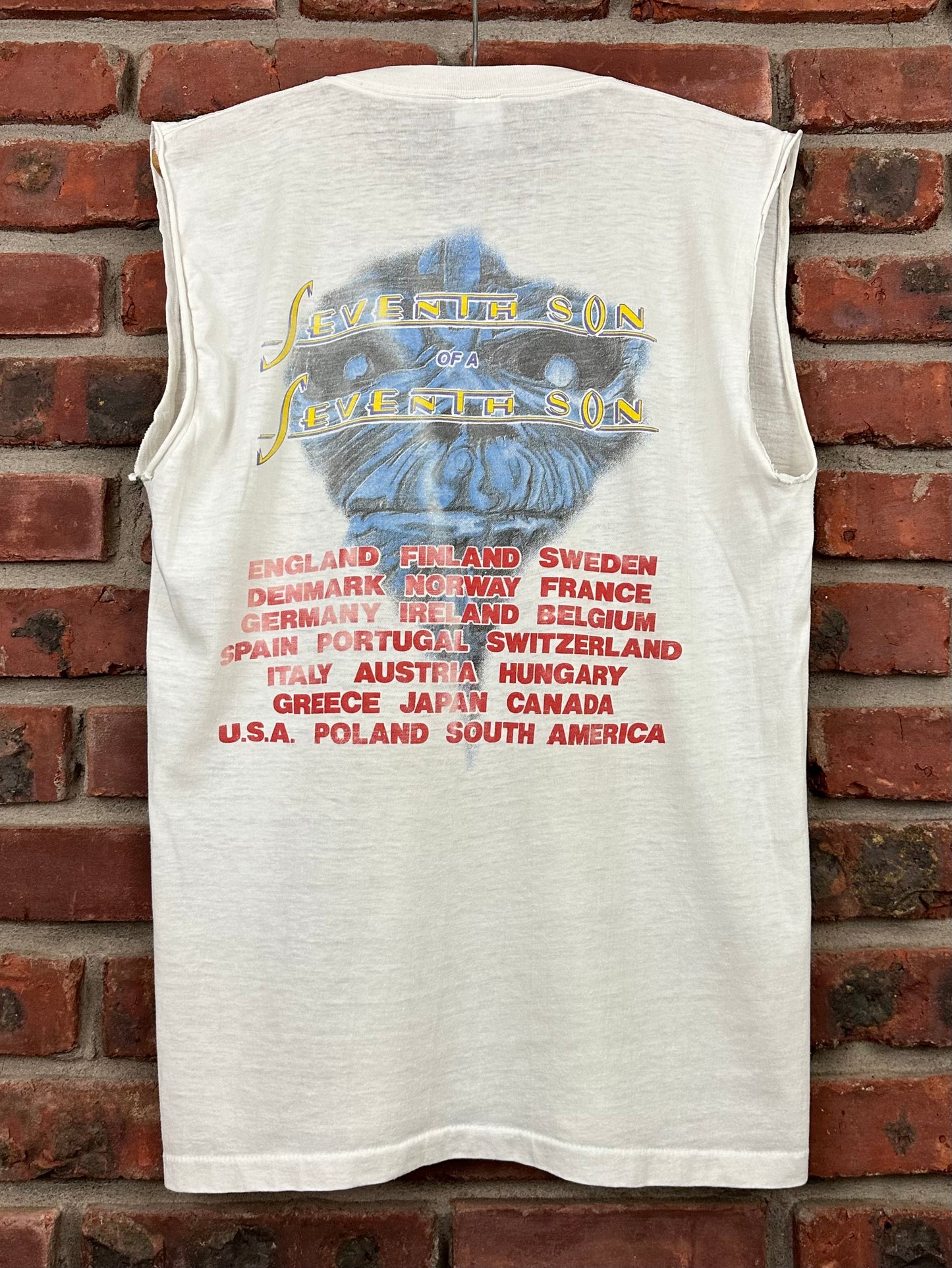 Vintage 80s 1980s 1988 IRON MAIDEN Seventh Son Of A Seventh Son Heavy Metal Rock Concert Tour Sleeveless T-Shirt Cut-Off Tank Top Thin Soft Faded White America Project Label Mens Medium M 19.25x27