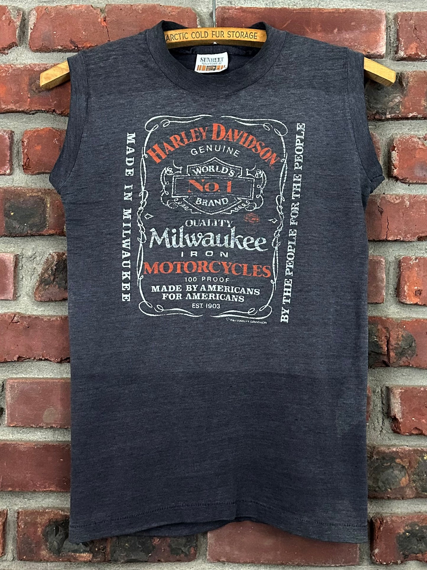 Vintage 80s 1980s 1982 HARLEY DAVIDSON Motorcycles Milwaukee Iron 100 Proof Whiskey Label Sleeveless Biker T-Shirt Tank Top Paper Thin Burnout Faded Black Sunbelt Sportswear Mens Small S 15.25x23.25